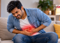 फूड पॉइजनिंग में पेट दर्द और ऐंठन से कैसे पाएं राहत, जानिए आसान उपाय और जरूरी सावधानियां